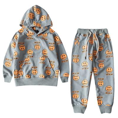 China Boys clothing sets kids clothes 2021 new autumn smile face kids hoodie set boys and girls hoodie street wear clothes for sale