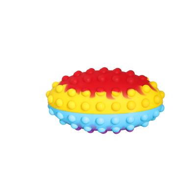 China K31 Easter Relaxing Bubble Toys Rainbow Silicone Ball Push Bubble Stir Sensory Oval Balls Rugby Effort Stir TOY for sale