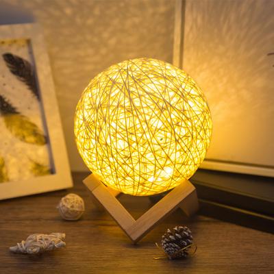 China Minimalist Multi-Color Globe Lamp Light Emitting Diode Lamp Ball Rattan USB Iron Solid Wood Base for sale