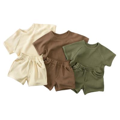 China 2023 ins style waffle baby clothes anti-shrink set wholesale t-shirt &shorts toddler clothing sets disused children for sale