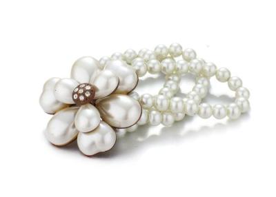 China Double Strand Braided Costume Pearl Bracelets With Diamonds Flower Pendant for sale