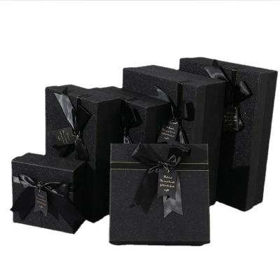 China Handmade Custom Luxury Black Cardboard Paper Garment Apparel Gift Packaging Box for sale