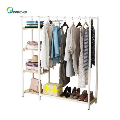 China Modern minimalist solid wood steel and multi-functional wooden hangers floor rack for sale