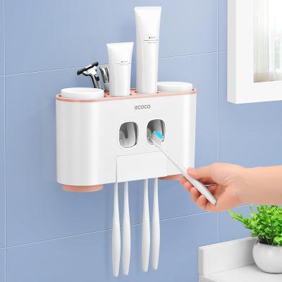 China Modern Toothbrush Holder Self-Motion Toothpaste Dispenser Toothbrush Fits Bathroom Products for sale