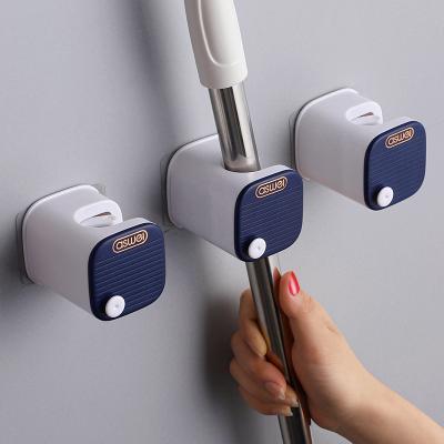 China ASM Household Wall Mount Hanger Modern Simple Hot Selling Plastic Sticky Hook Broom for sale