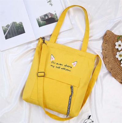 China Lightweight Newcomers Tote Bag Cotton Canvas Crossbody Bags Yellow Handbags For Girls With Detachable Straps Letter Print Shoulder Bag for sale