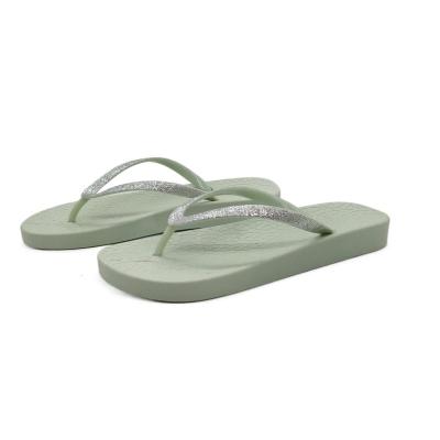 China Fashion trend summer beach sandal trend personality light green men and women striped outdoor beach flip flops for sale