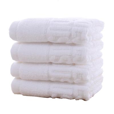 China Factory wholesale custom embossed white cotton hotel 100% disposable hand towel child safe for sale