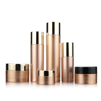 China Luxury cosmetic skin care packaging rose gold bottle set cosmetic skin care packaging container jar for sale