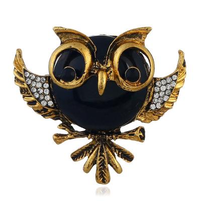 China Fashionable personality diamonds gem owl brooch alloy cute owl retro exaggerated crystal animal brooch for sale