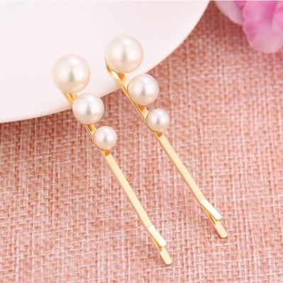 China Sweet factory direct creative faux pearl stone word clip hairpin for ladies kids gift for sale