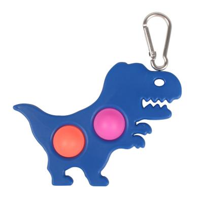 China Fuuny Toy Dinosaur Key Chain Rainbow Silicone Tighten Key Chains Silicone Decompression Jumping Key Chain for sale