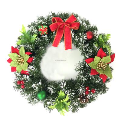 China Wholesale Christmas Greenery PVC Christmas Circle Garland Plastic Wreath With Poinsettia Flowers Hanging Decor Snowy Garland With Red Bowknot for sale