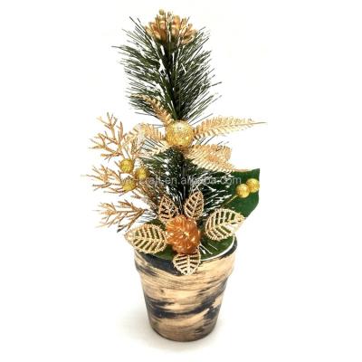 China Hot Selling Retro Christmas Ornament Pine Needle Tree Flower Decoration Table Plastic Pot Artificial Christmas Tree With Berries for sale