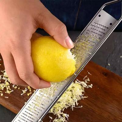 China Hot Selling Premium Viable Hand Press Cheese Lemon Citrus Graters with Good Handled Handles for Kitchen Food Peeler Tornado Crusher for sale