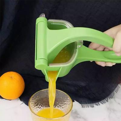 China Multi Viable Purpose 2-In-1 Hand Squeezer Lemon Lime Squeezer For Home Orange Juice Long Handle Handy Tool Kitchen Plastic Instruments for sale