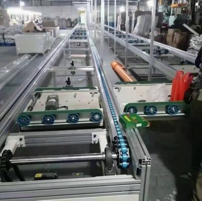 China PLC Control Fire Resistant Automatic Double Speed ​​High Quality Chain Conveyor For Production Line for sale