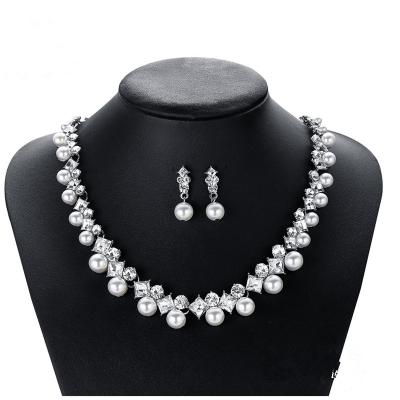 China New Romantic Creative Bride Pearl Necklace Earrings Wedding Jewelry Set Factory Wholesale for sale