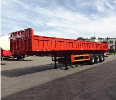 China Medium and long-distance transportation of heavy bulk goods transportation barrier flatbed semi-trailer high-quality goods and multifunctional barrier cargo trailer for sale