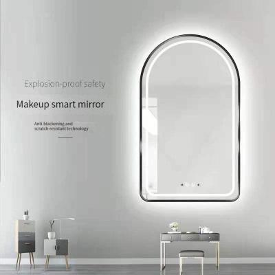 China Illuminated newly designed bathroom irregular smart mirror touch screen has a frame and led light for sale