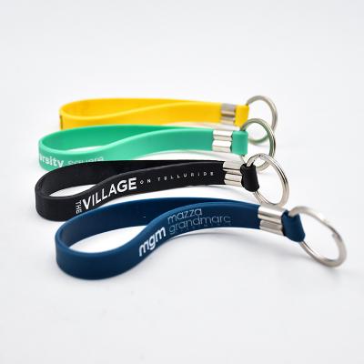 China Events Promotional Wholesale Logo Printing Silicone Key Ring Key Chain Wristband Rubber Custom Wristband Promotional Gifts for sale