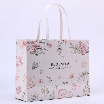 China Lipack Recyclable Custom Fashion Your Own Logo Print Cosmetics Luxury Brand Gift Shopping Paper Bags With Handle for sale