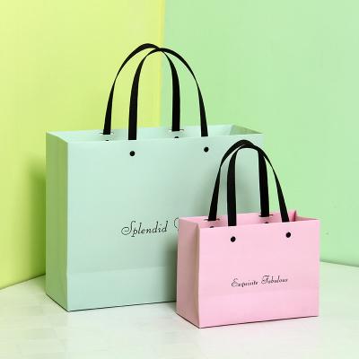 China Hot Sale Recyclable Luxury Wedding Souvenirs Lipack Gift Paper Bag With Flat Handle for sale