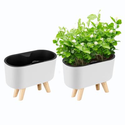 China New minimalist wholesale white without water level indicator plastic flower pots, self watering plastic flower pots, indoor flower pots for sale