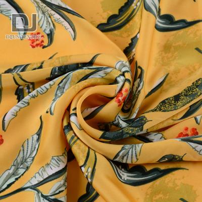 China Wholesale Dress Material Lightweight 20+26*50D Print Anti-Static Leaves Polyester Satin Fabric for sale