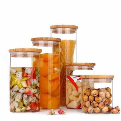 China Borosilicate Sustainable Circular Glass Jars Glass Jars Store Food Container Storage Tank with Bamboo Lid for sale