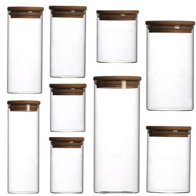 China Custom Sustainable Food Storage High Borosilicate Decorate Fancy Glass Jars With Bamboo Lid for sale