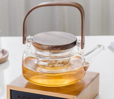 China High Quality Borosilicate Glass Teabloom Stovetop Microwave Safe Glass Teapot for sale