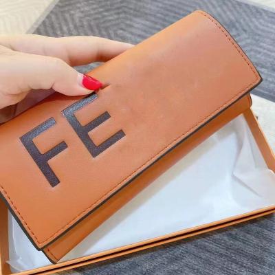 China Luxury Brand Women Wallets Fashion Waterproof Brand Letter Long Triple Wallet Purse Female Cool Leather Clutch Card Holder Cartera Mujer for sale