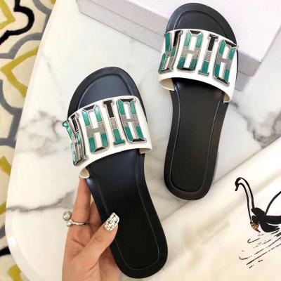 China 2022 fashion trend the same sandal with the metal button lace-up slippers, women's electronic flip-flops, fashion Korean version of the soft sandals for sale