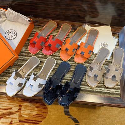 China Fashion NEW H 2022 trend slippers women summer fashion wear soft flat outdoor slippers beach holiday shoes for sale