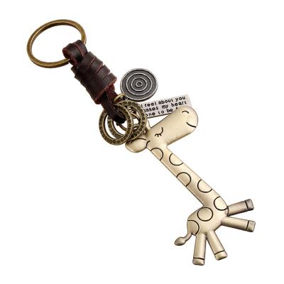 China Retro Cowhide Cute Animal Giraffe Bronze Leather Key Chain Eco-friendly Leather Key Chain For Gift for sale