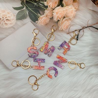 China Custom English Alphabet Letter 26 Key Chain DIY Resin Bag Eco-friendly Charm Creative Gift Key Chain for sale