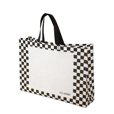 China Factory Waterproof Custom Logo Tote Bags Plaid Black And White Non Woven Bags for sale