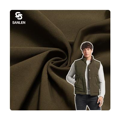 China Waterproof 150D 21S spun yarn memory cotton padded 100% recycled stretch polyester woven outer fabric for down jacket for sale