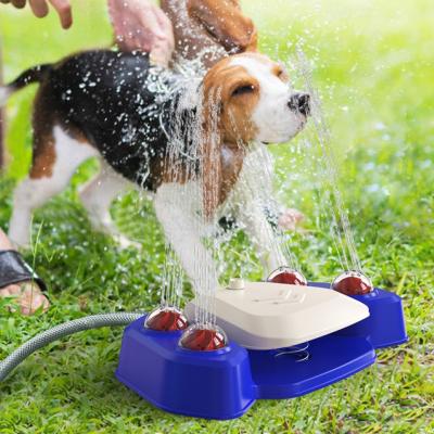 China Viable Outdoor Garden Pet Water Fountain Step On Automatic Dog Sprinkler Driver Water Dispenser Dog Bath Sprinkler Dog Toy for sale