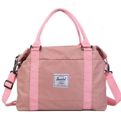 China New fashion pink and green travelTravel bag overnight wet dry separation fitness sports bag large capacity folding travel bag custom logo for sale