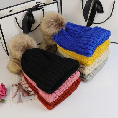 China COMMON Kids Winter Knit Soft Fur Pom Pom Angora For Children Raccoon Flip Beanie Hats With Big Fur Hat Boys Girls for sale