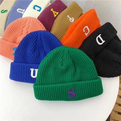 China COMMON Custom Unisex Beanie Caps Multicolor Letters Beanie Cap Winter Beanie Hat Knitted Hat for Men and Women for sale