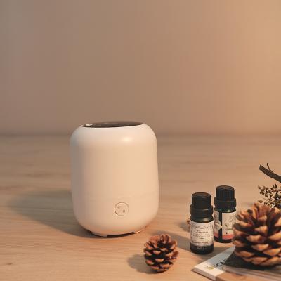 China Home/Hotel/Company Committed Built In Evasive Design Ultrasonic Aroma Diffuser Essential Oil Humidifier With Spotlight for sale