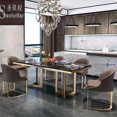 China Wholesale Modern Luxury Black Marble Extendable Dining Table Set Gold Stainless Steel Marble Dinner Table and Chairs for sale