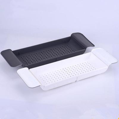 China Household Kitchen Drain Basket Sink Shelf Storage Plastic Retractable Shelf For Fruit Vegetables for sale