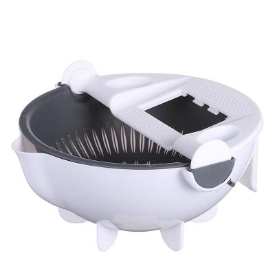 China Viable Multifunctional Plastic Grater Peeler Slicer Drain Basket Washing Vegetable Baket Grater for sale