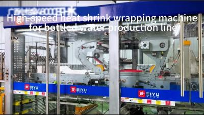 China High speed heat shrink film packaging machine for 48000BPH bottled water production line zu verkaufen