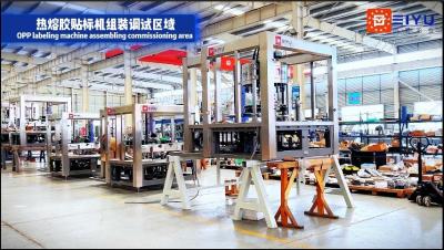 China Hot melt glue labeling station/Hot melt glue labeling machine assembly and debugging workshop zu verkaufen