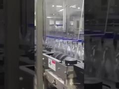 03-21 60000BPH hot melt adhesive labeling machine for 500ml PET bottled water production line